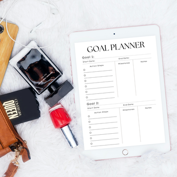 Digital Goal Planner on an iPad next to purse