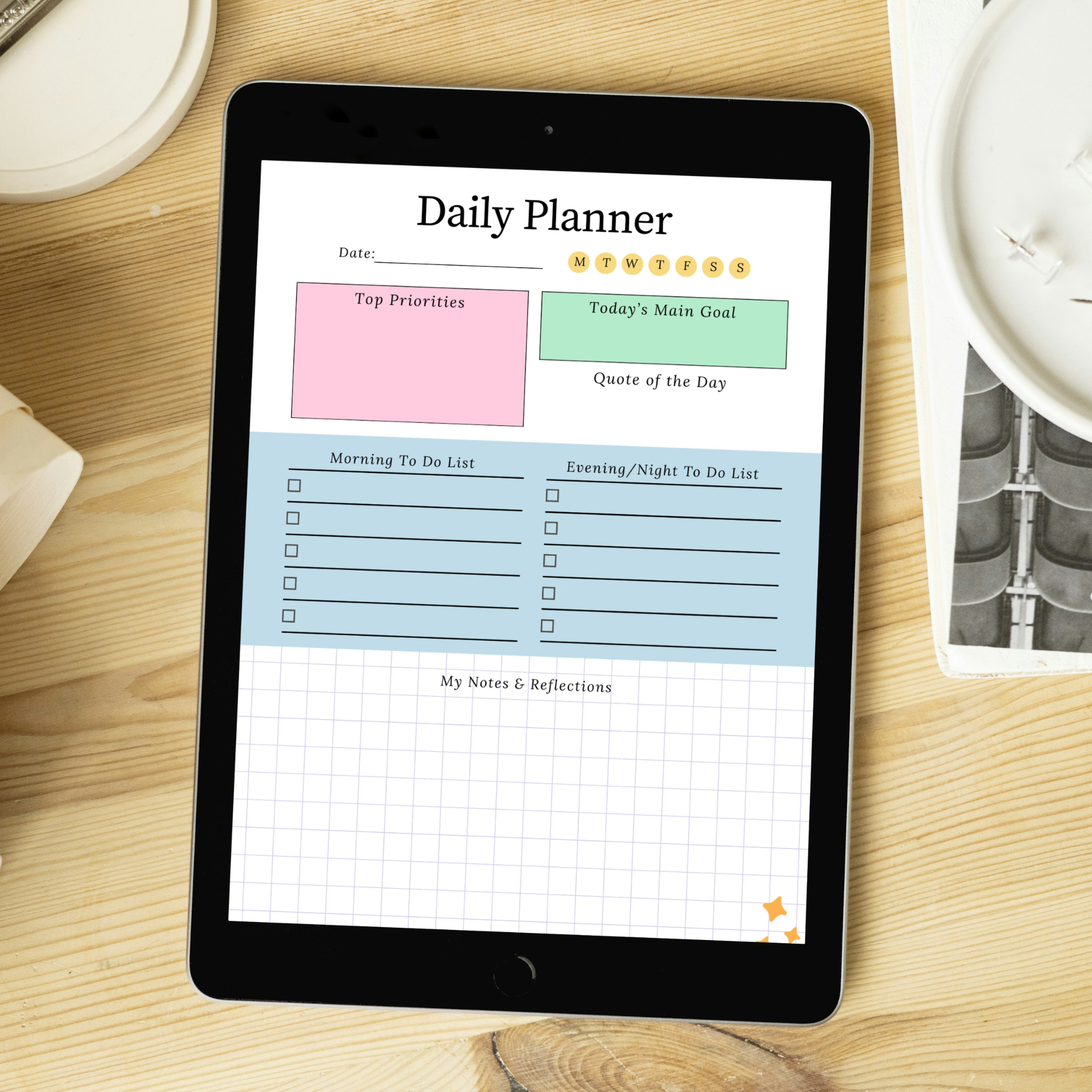 Digital Daily Planner PDF open on iPad tablet on wooden desk showing morning evening to do list top priorities and daily goals — instant download for GoodNotes and Notability