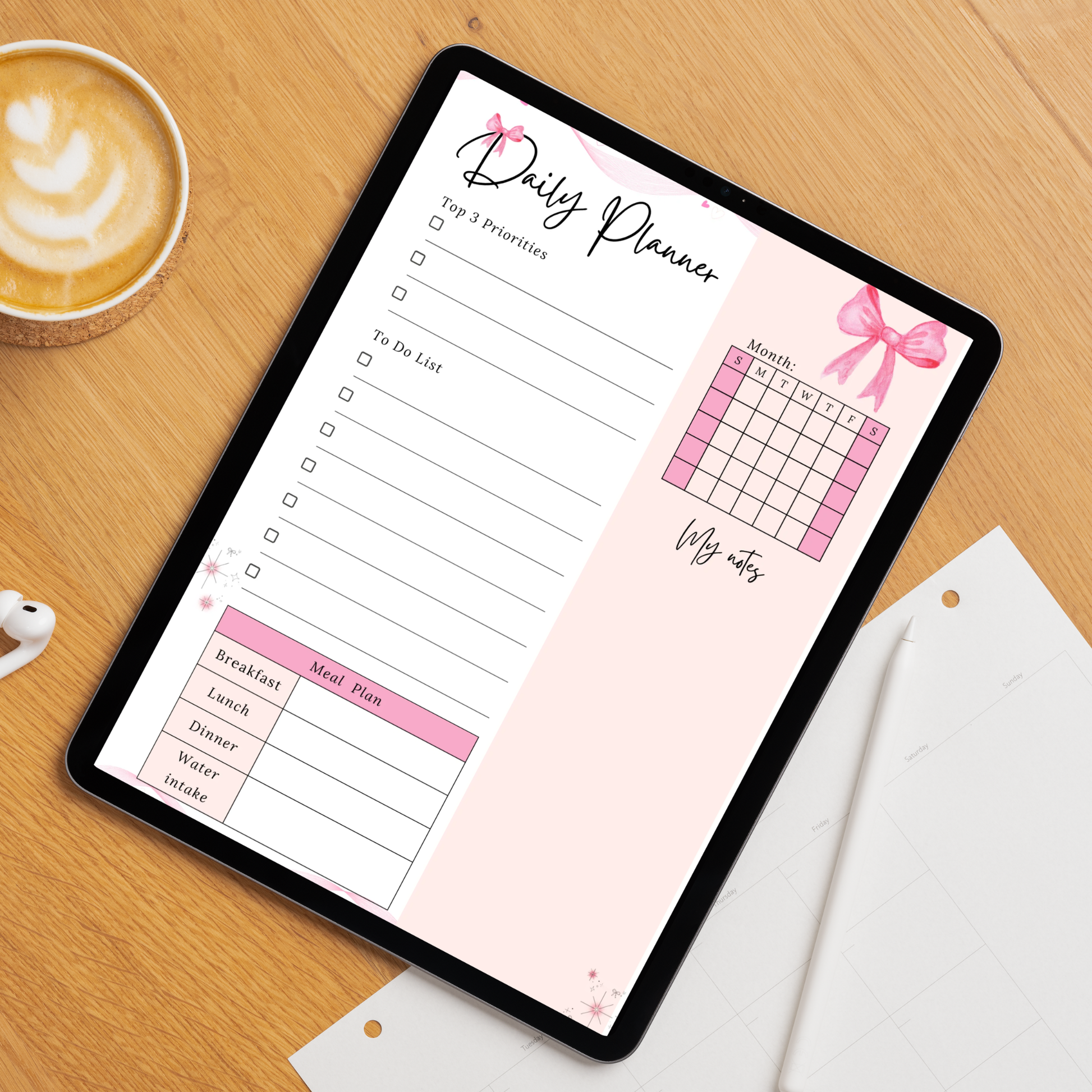 Pink bow undated digital daily planner PDF template shown on an iPad with a soft pink and floral design, featuring a top 3 priorities section, to-do list, monthly mini calendar, meal plan tracker for breakfast lunch dinner and water intake, and a notes section — compatible with GoodNotes, Notability, Noteshelf, XODO, Samsung Notes, and Kindle Scribe.